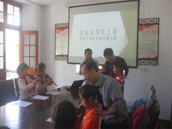 20170612113705_金山小學(xué)關(guān)工委走進(jìn)西津古渡社區(qū)居民學(xué)校.jpg